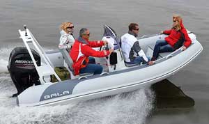Group boating in the bay on a 15ft Gala rigid inflatable boat RIB equipped with steering console, arch, and Mercury outboard motor.